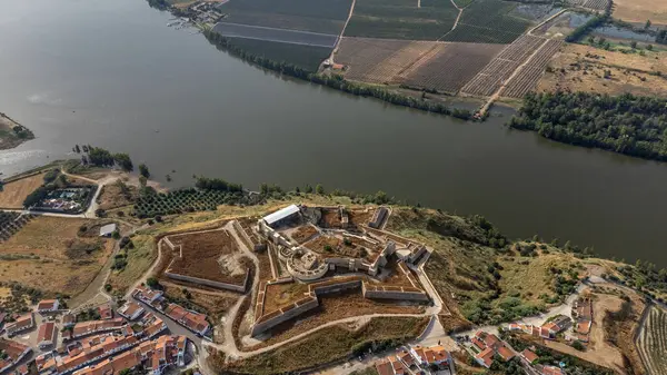 stock image Juromenha, Alentejo, Portugal. June 16, 2024. Aerial view of Juromenha Castle in Alentejo, overlooking the Guadiana River, showcasing historic ruins and scenic landscapes.