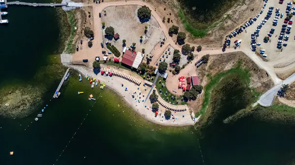 stock image Bird's-eye view of Monsaraz river beach at Alqueva Dam, featuring golden sands and tranquil waters, nestled in a stunning natural setting. Ideal for peaceful and scenic visuals.