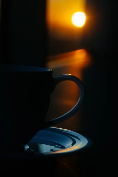 coffee cup and sunrise in hotel