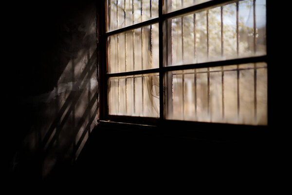 Light shining through an old window