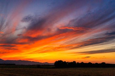Hokkaido 'da günbatımı ve alan