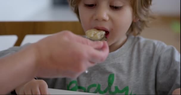 Boy Talks While Seated Breakfast Table Digital Tablet Front Him — Stock Video