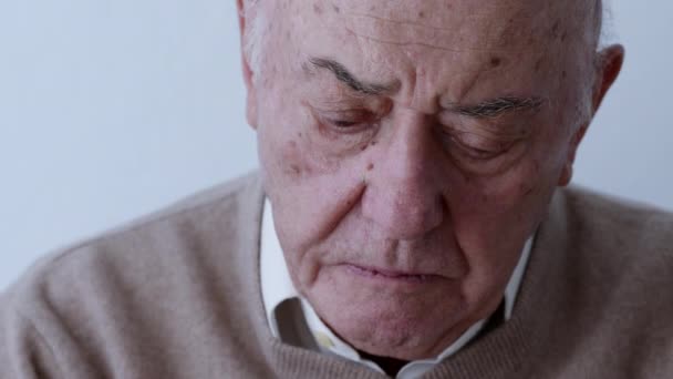 Elderly Man Dressed Cozy Sweater Appears Deep Thought His Gaze — Stock video