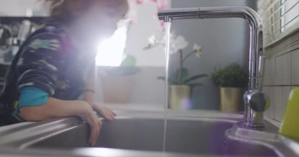 Cute Boy Curly Hair Leans Kitchen Sink Drink Water Straight — Stock videók