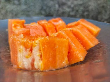 Papaya 'nın yakın görüntüsü, lezzetli Asya yemekleri.