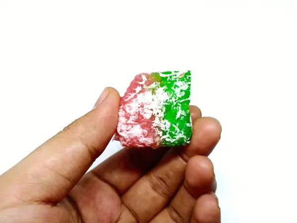 # Renkli bir şekeri tutarken #