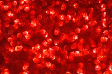 Soyut kırmızı parlak parıltı bulanık Noel ve Yeni Yıl arkaplanı, metin ve tasarım için kopyalama alanı