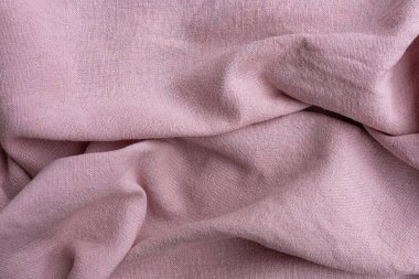Arkaplan dokusu. Açık mor kumaş çeşitli tasarım uygulamaları için ideal yumuşak, desenli keten veya pamuk yüzeyi sergiler.