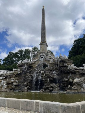  Schonbrunn Palace, German - Schloss Schonbrunn, and Great Parterre French Garden with beautiful flower beds in Vienna, Austria. High quality photo clipart