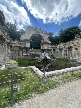  Schonbrunn Palace, German - Schloss Schonbrunn, and Great Parterre French Garden with beautiful flower beds in Vienna, Austria. High quality photo clipart