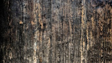 Eskimiş ahşap bir yüzeye yakın çekim. Bu doku arka plan, pankart veya rustik tasarımlar için idealdir.