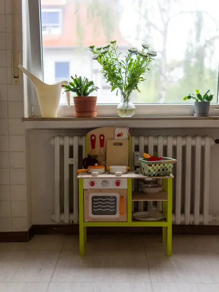 stock image toy wooden kitchen with dishes. High quality photo