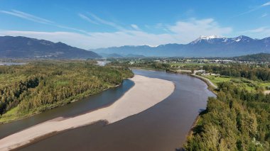 Aerial view of the Island 22 Regional Park along Fraser River in Chilliwack, British Columbia, Canada. clipart