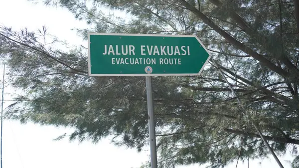 stock image Evacuation route sign at Pasir Putih beach Situbondo