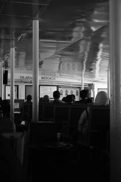 stock image Ferry passengers sitting inside an Indonesian ferry