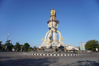 Monument at Benoa harbor Bali clipart