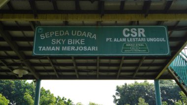 A sky bike sign in Singha Park Malang which has not been operating for a long time and has been neglected clipart