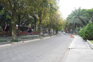 Quiet streets in the Brawijaya University area on a weekend morning clipart