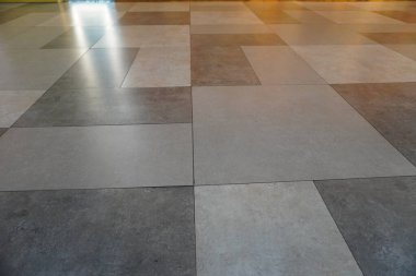 Dark and light colored floors arranged randomly with a marble motif clipart