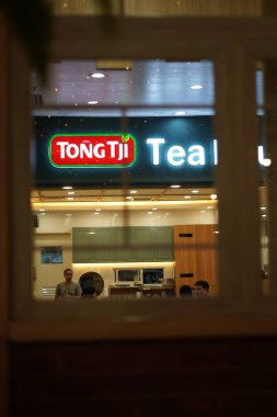 Tong Tji restaurant logo inside a mall clipart