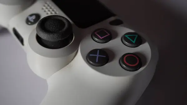 Stock image  Action button and right analog on a white Playstation 4 controller