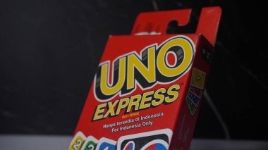 Indonesia's special Uno Express packaging which is the Uno card series with the fastest game clipart