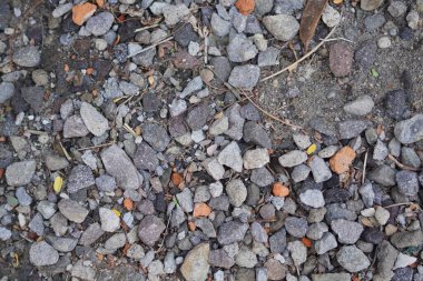 Çeşitli şekillerde gri çakıl taşlarının arkaplanı