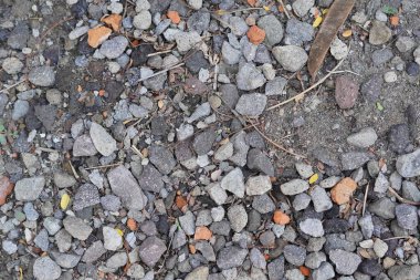 Çeşitli şekillerde gri çakıl taşlarının arkaplanı