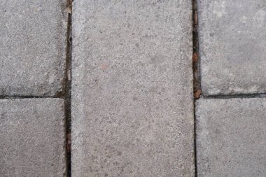 Çizgileri olan gri kaldırım bloklarının arkaplanı