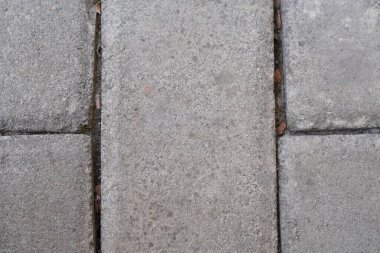 Çizgileri olan gri kaldırım bloklarının arkaplanı