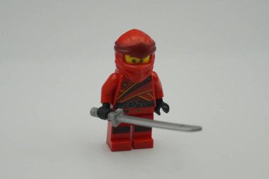 Lego minifigure ninjago red bricks toy with white background clipart