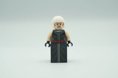 Lego Magpie minifigure DC character with black dress and white background clipart