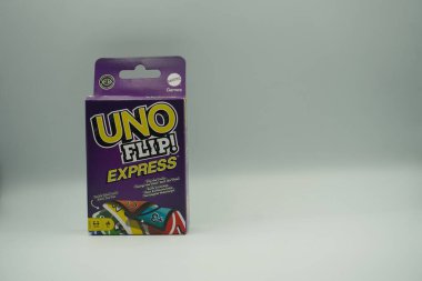 The box of the UNO Flip Express card game is purple with a white background. clipart