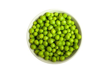 Taze organik yeşil bezelyeler beyaz yuvarlak kasede masada yumuşak odak, beyaz, üst görüş izole