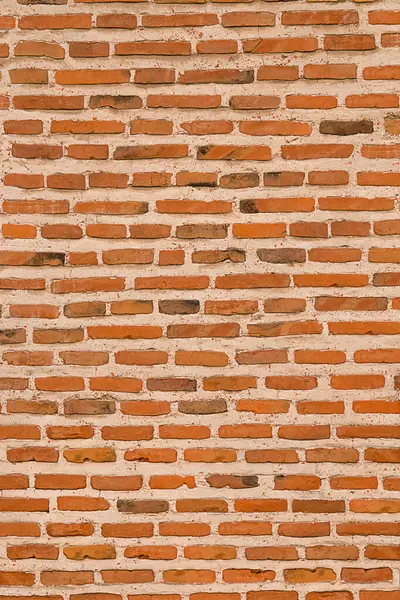 Eski tuğla duvar arka planı. Kırmızı tuğlalarla kaplı bir duvar.