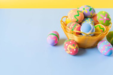 Easter eggs many color in basket for easter background