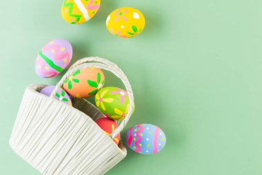 Easter eggs many color in basket for easter background