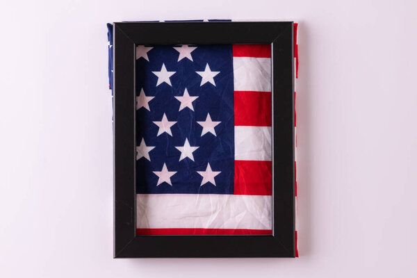 Happy presidents day concept with flag of the United States on white background with tulips for top view concept