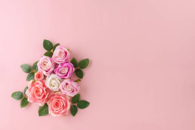 Happy Women's Day decoration concept made from rose flower on pastel background.