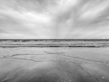 beautiful sunset on black and white photo at Pantai sepat beach.
