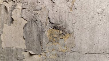 Yıpranmış ve kirli siyah duvarlar. Eski yıpranmış duvarlar Duvarlar yüksek nem ve yaşlılıktan dolayı soyulmuş boyayla kaplı. Eski küflü duvarlar. Olaysız duvar yüzeyleri. Kirli duvarlar.