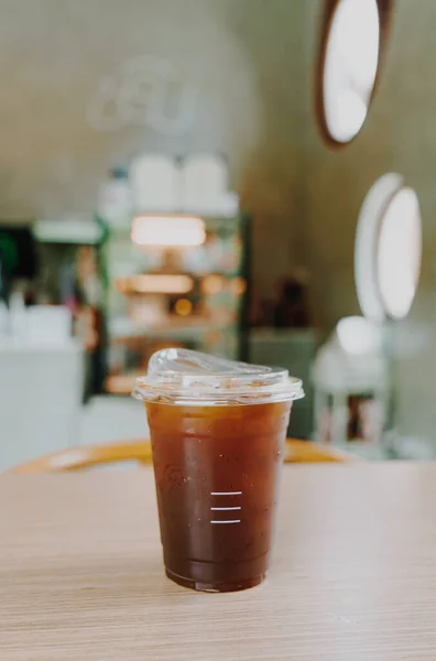 iced americano coffee or long black coffee glass in coffee shop cafe