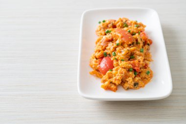 Stir-fried tomatoes with egg or Scrambled eggs with tomatoes - healthy food style