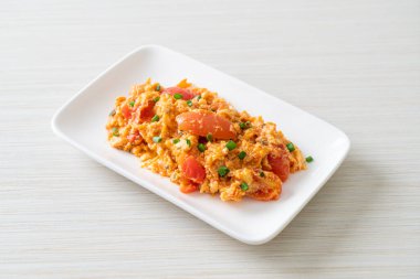 Stir-fried tomatoes with egg or Scrambled eggs with tomatoes - healthy food style