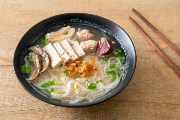 stock image Vietnamese Rice Noodles Soup with Vietnamese Sausage served vegetables and crispy onion - Asian food style