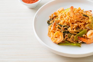 Stir-fried instant noodles sukiyaki with shrimps - Asian food style