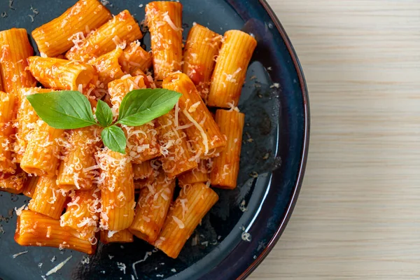 stock image Rigatoni pasta with tomato sauce and cheese - traditional Italian pasta