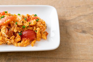 Stir-fried tomatoes with egg or Scrambled eggs with tomatoes - healthy food style