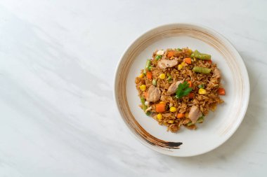 Domuz eti ve sebzeli pilav.