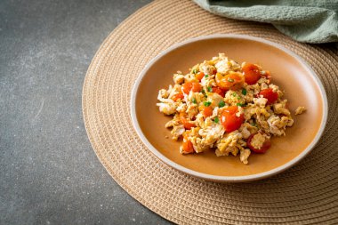 stir-fried tomatoes with egg on plate - healthy food style